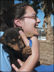 Women holding a puppy